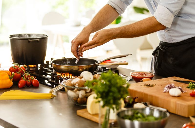 Fresh vegetables being prepared on a kitchen counter
